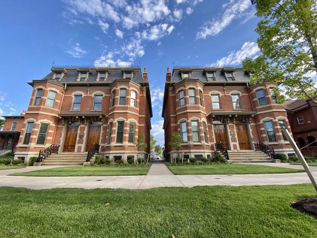 Two restored Second Empire brick row houses